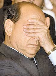 Berlusconi, durante evento da Associa��o Italiana de Com�rcio   Plinio Lepri/Associated Press