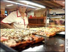 Pizzas no forno, na It�lia